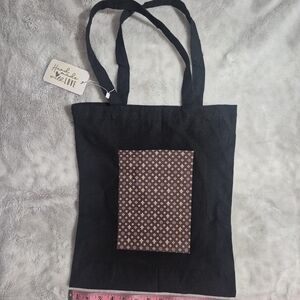 Elegant Black Tote Bag with Brown Pattern